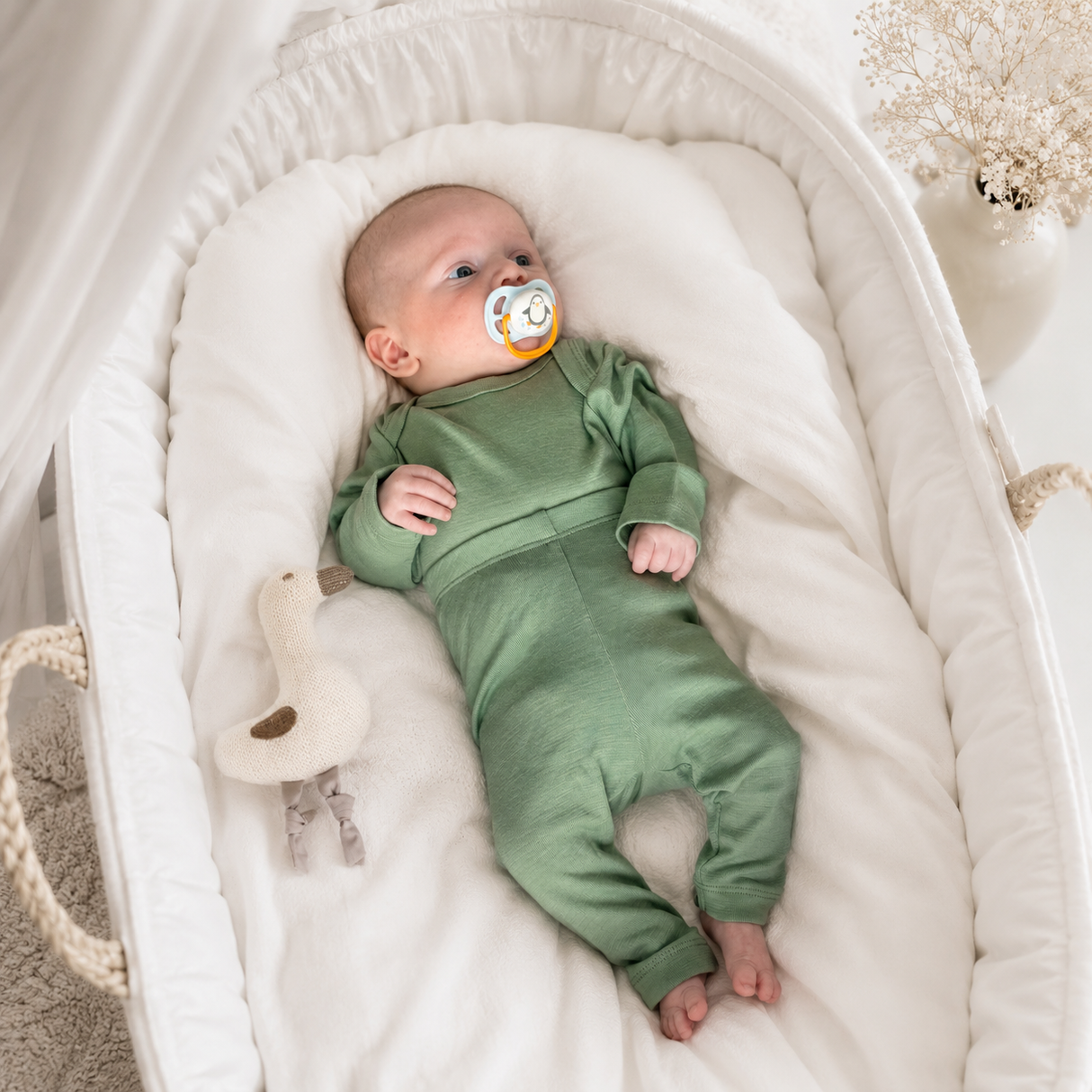 Long-sleeved round-neck bodysuit made from 100% certified fine merino wool