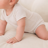 Short-sleeved bodysuit made from 100% certified fine merino wool