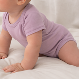 Short-sleeved bodysuit made from 100% certified fine merino wool