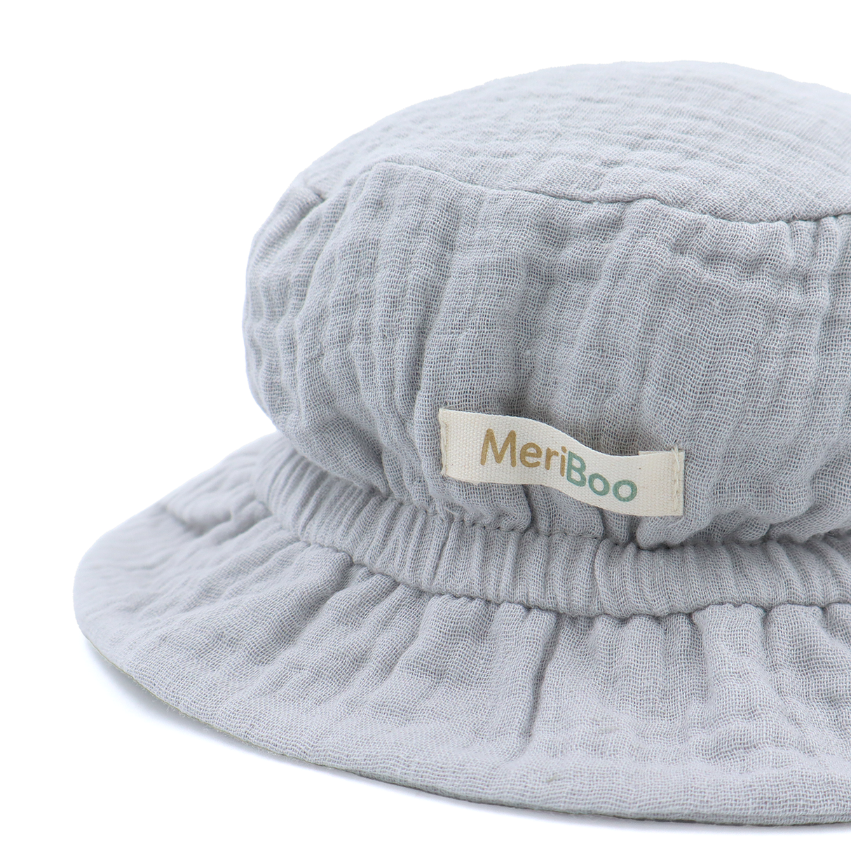 "Soft Breeze" hat made of 100% organic muslin with an extended back to protect the neck