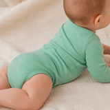 Long-sleeved round-neck bodysuit made from 100% certified fine merino wool